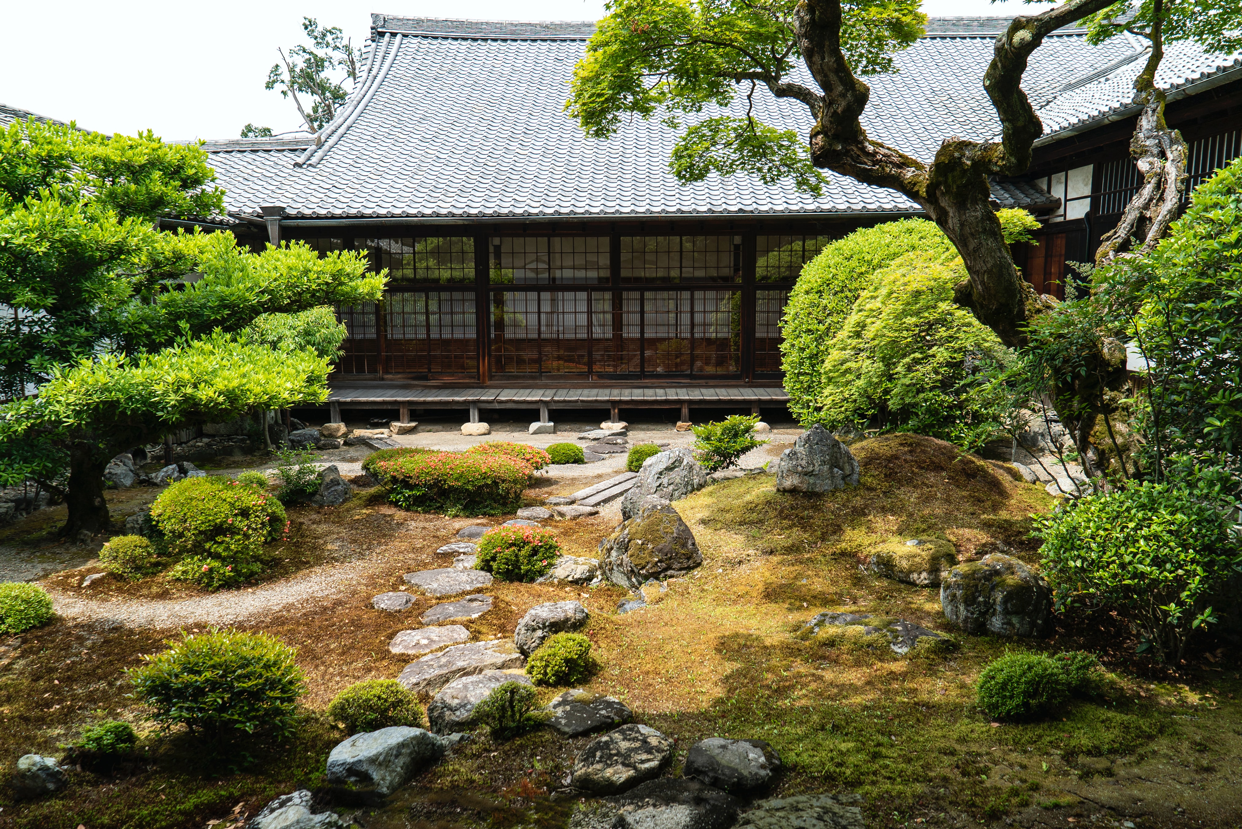 Zen-Inspired Layout - Japanese-style garden with raked gravel